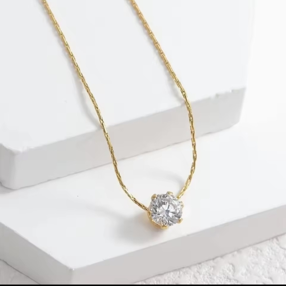 Elegant Gold Necklace with Silver Crystal Pendant